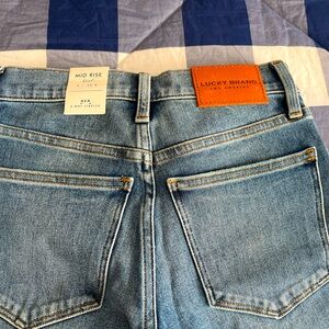 Lucky Brand mid rise Ava Bootcut 4 way stretch size 26 regular length